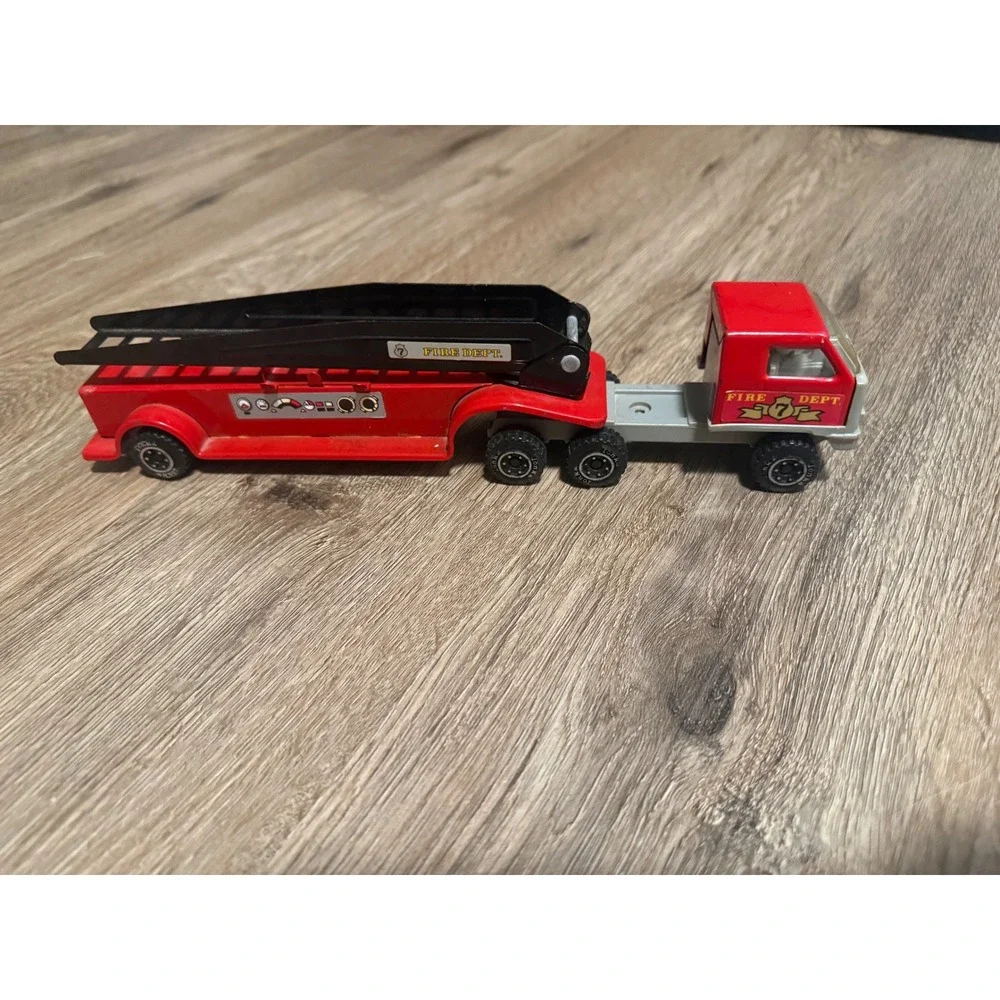 Vintage Tonka Fire Dept No 7 Ladder Truck Red Diecast Pressed Steel Toy Vehicle